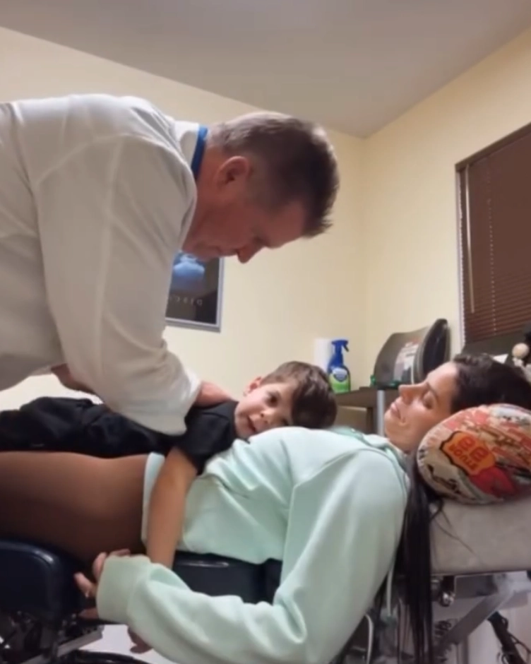 Chiropractor Reseda CA Bert Vanderbliek Adjusting Young Boy